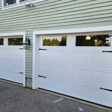 residential garage with double garage doors